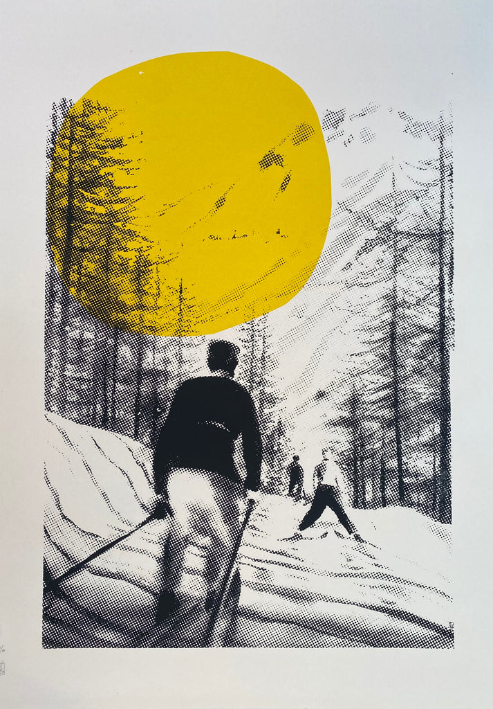 A limited edition screen print of a skier on a snowy mountain with a prominent yellow sun in the background. The print captures a black and white scene with details of trees and a second skier in the distance.