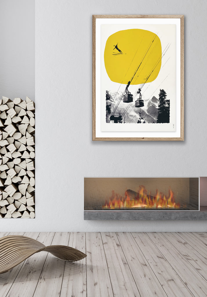 yellow ski wall art with ski jumper framed on a wall above a fireplace. 