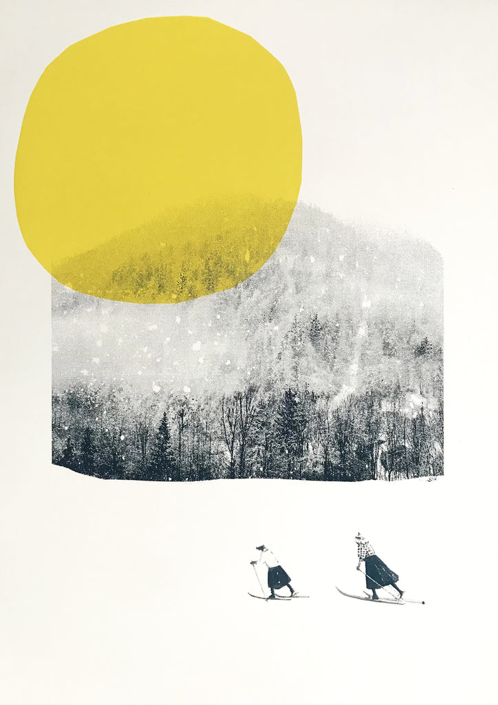 2 cross country skiers against a mountain backdrop and huge yellow sun
