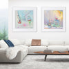 living room with colourful figurative  ski art prints depicting chair lifts over sofa